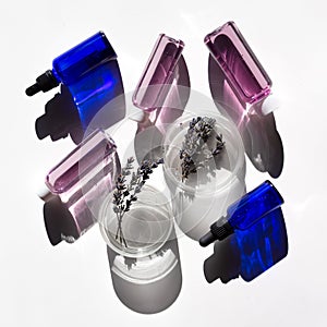 Abstract cosmetic or chemical laboratory. Laboratory equipment, flasks, test tubes, petri dishes. Creative concept with hard