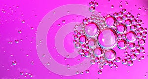 Abstract cosmetics bubbles floating background. Liquid purple abstract backdrop.