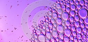 Abstract cosmetics bubbles floating background. Liquid purple abstract backdrop.