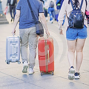 Abstract couple of travelers with luggage, suitcases and backpack, concept of travel and tourism concept