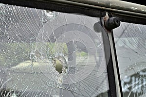 Abstract Cracked Window Glass on Antique Truck