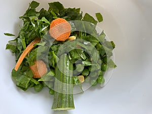 Abstract creative tree made with peas spinach drumstick a