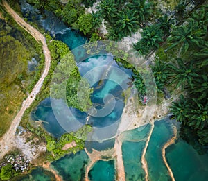 Abstract crystal clear Emerald pool during sunrise F.