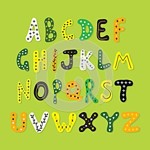 Abstract cute colorful kids cartoon alphabetical letters set icons poster design elements on green background