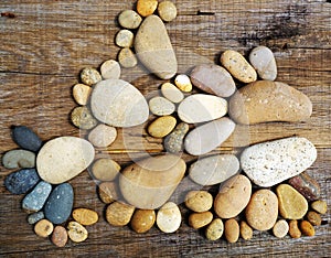 Abstract cute pebbles, footprint from boulder