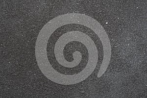 Abstract dark background,Rough surface of black spray paint on Rusty iron plate