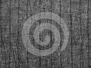 Abstract dark black and gray textured grunge background or backdrop with vertical lines