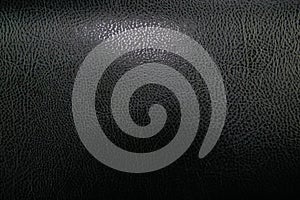 Abstract dark black shagreen texture. Leather background
