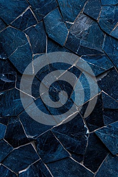 Abstract dark blue stone tile wall texture background.