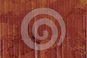 Abstract dark brown red cardboard paper carton surface wrinkles parcel texture with grunge cardboard sheet paper pattern