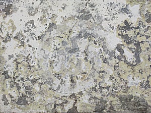 Abstract Dark Grunge wall texture background. Paint cracking off dark wall with rust underneath.distressed crackled texture.