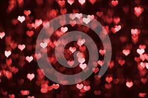 Abstract dark valentine background with red hearts