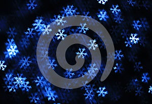 Abstract dark winter background with navy blue and white snowflakes