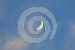 Abstract daytime crescent moon in the sky background