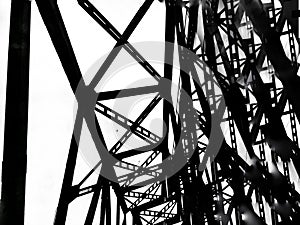 Abstract deconstruction architecture black and white manipulated photo of bridge metal construction. Geometry art photo