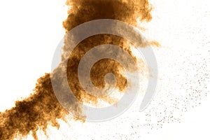 Abstract deep brown dust explosion on white background.