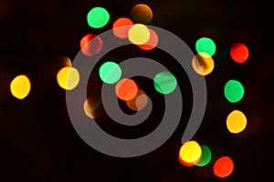 Abstract and defocused background of christmas lights photo