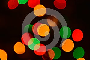 Abstract and defocused background of christmas lights photo