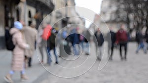 Abstract Defocused Blurred Background of many people on street