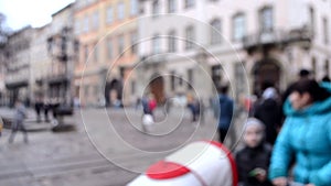 Abstract Defocused Blurred Background of many people on street