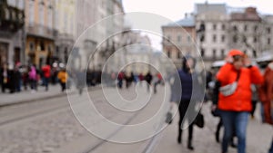 Abstract Defocused Blurred Background of many people on street