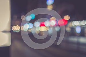 Abstract defocused and blurred city nightlife with bokeh for background usage