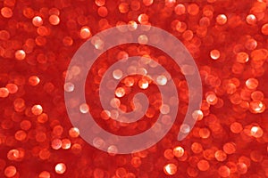 Abstract defocused red glitter background