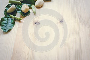 Abstract design background vegetables on a wooden background.