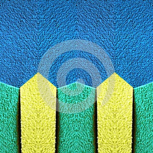 abstract design with cuts of foamy in green, yellow and blue, background and texture