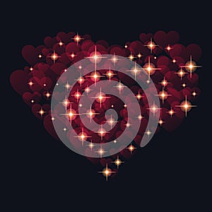 Abstract design - heart with glowing sparkling particles on a black background