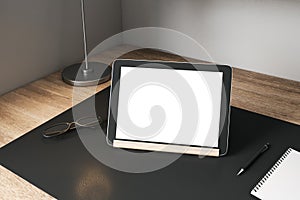 Abstract designer desktop with empty tablet
