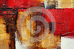 Abstract detail of acrylic paints on canvas. Relief artistic background in gold, red, black and silver color