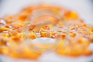 Abstract detail of cannabis oil concentrate aka shatter