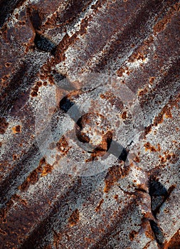abstract detail of a rusty corrugated sheet