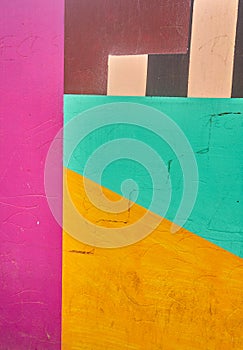 Abstract detail of wall with fragments of colorful graffiti. Close-up of urban art. With place for your text, for background use.