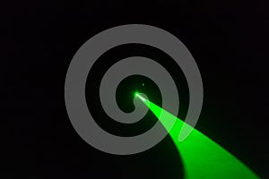 Abstract of digital green light laser line, disco light show, stage lights with laser..Green laser beams light effect on black bac