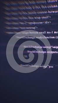 Abstract digital screen with blurred lines of code, symbolizing cybersecurity, data transmission, and information