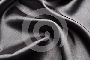 Abstract, elegant background texture with waves of silk fabric