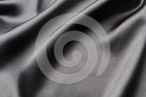 Abstract, elegant background texture with waves of silk fabric