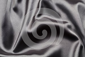 Abstract, elegant background texture with waves of silk fabric