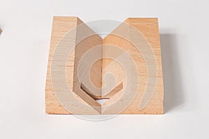 The Abstract elements Wooden blocks, decorative cut in tree, close-up on white background