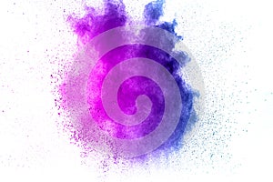 Abstract explosion of purple dust on white background.Abstract purple powder splatter on white background