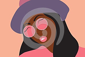 Abstract face portrait of a girl with tanned skin in hat and sunglasses.