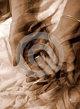 Abstract female bare hands of cloth