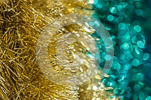 Abstract festive bright colorful background of Christmas garlands with bokeh. The predominance of