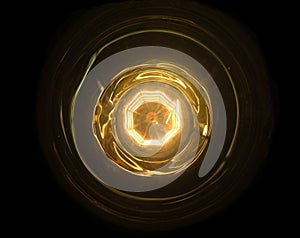 Abstract fire ball with core inner and ring.Technology power source concept.Close up under light bulb