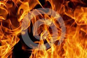 Abstract flame, fire flame texture, background. Tongues of fire on a dark background.