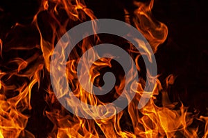 Abstract flame, fire flame texture, background. Tongues of fire on a dark background.