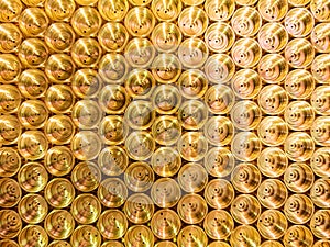 An abstract flat industrial close-up background of shiny brass metal threaded hexagonal fitting parts