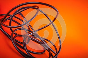 Abstract flexible audio cable on orange, nice